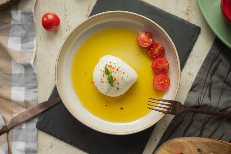 Burrata caprese salad with tomatoes and fresh basil