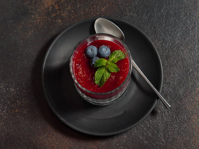 Vanilla panna cotta with berry coulis