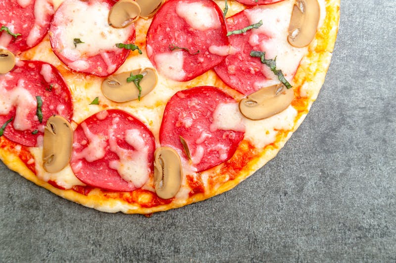 Prosciutto and fig pizza with gorgonzola and arugula